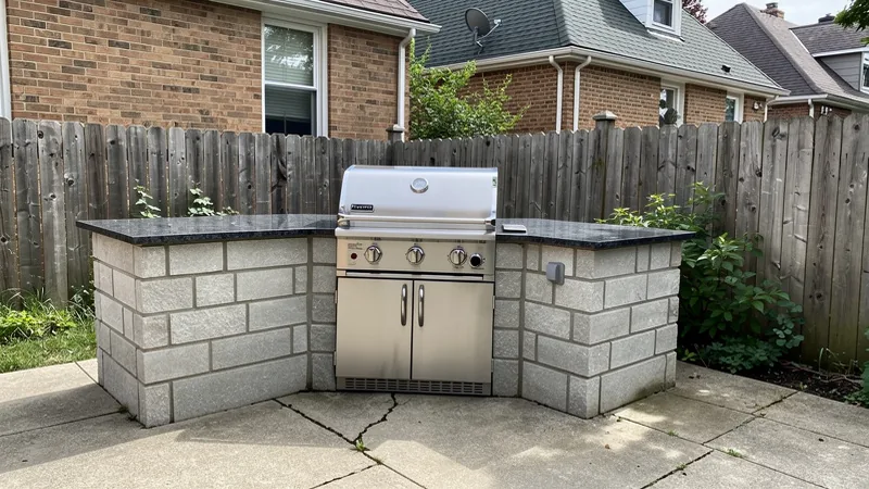 Compact built-in grill island on a patio in Holden, MO
